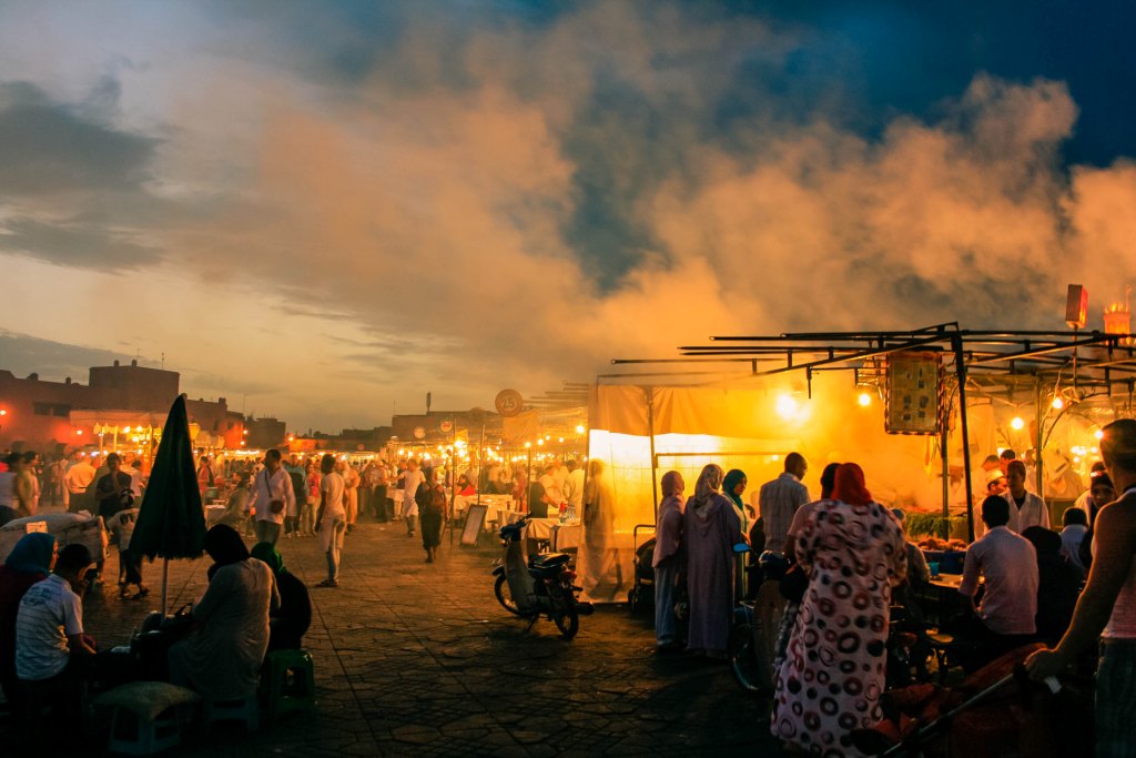 A bustling open air market at night